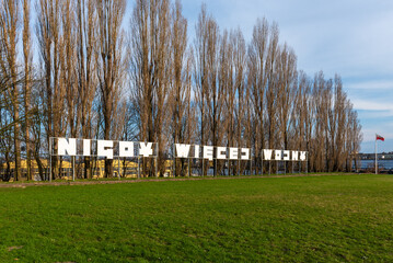 The inscription - Nigdy wiecej wojny (in English: No more war).Gdansk Westerplatte, Poland - obrazy, fototapety, plakaty