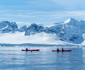 Kayaking among iocebergs and surrounded by wonderful wildlife, Paradise Bay, Antarctic Peninsula,...