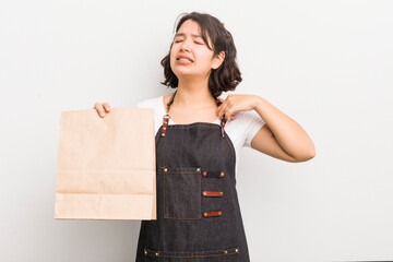 pretty hispanic girl feeling stressed, anxious, tired and frustrated. take away employee