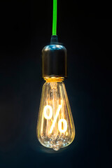 Bulb with glowing percent mark inside of it, creativity concept