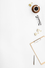 Top view of empty paper on clipboard on office desk table