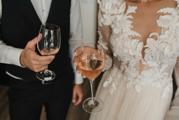 Bride and groom drinking champagne stock photo