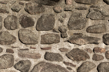 Stone Wall With Rare Large Stones. Textures As A Background