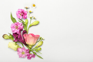 Composition with different beautiful flowers on white background