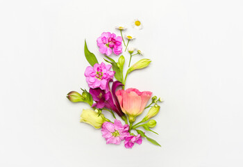 Composition with different flowers on white background
