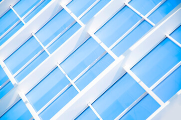 Obraz premium Geometric blue abstract background with triangles and lines.