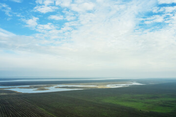 Obraz premium steppe plain landscape lake in the middle of fields