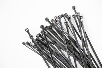 Black cable tie on the white background