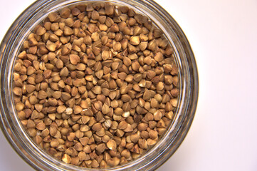 Buckwheat in a jar. Top view. Close up.