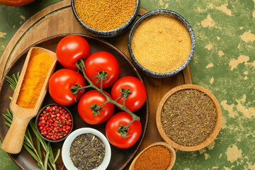 Composition with aromatic spices and tomatoes on color background, closeup