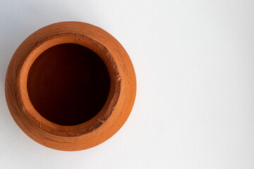 Clay pot shot flatlay on white background and copy space