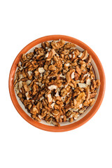 Plate with walnut grains isolated on white background.