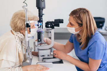 senior woman having eyesight examination