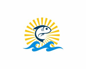 Jumping fish on the sea waves logo