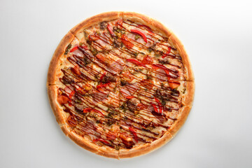 Pizza with bacon, sausages, beef and cheese, on a white background