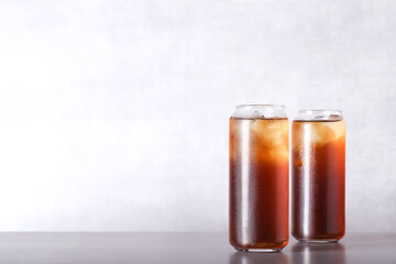 iced iced tea stands on a light background