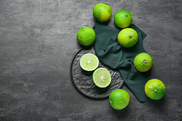 Composition with ripe bergamot fruits on dark background