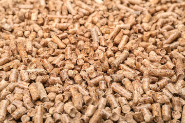 Wood pellets as background, closeup