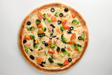 Pizza with olives, broccoli, tomatoes, red fish and cheese on a white background