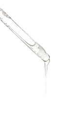 Glass dropper with sample of cosmetic serum isolated on white