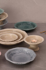 Crockery on a grey textured stone.