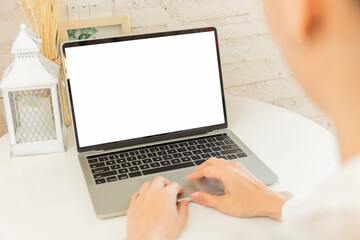 computer screen blank mockup.hand woman work using laptop with white background for advertising,contact business search information on desk at coffee shop.marketing and creative design