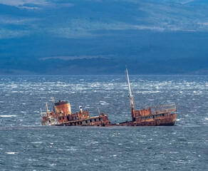 Ship wreck on the treacheropus waters of the Beagle channel between Chile and Argentina