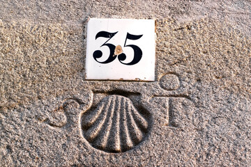 shell scallop symbol of way of st James on old stone home in Santiago de Compostela city , Galicia...