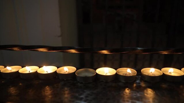 Burning candles in the dark