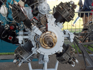 Fototapeta premium Old aircraft engine with wood propeller, vintage plane close up