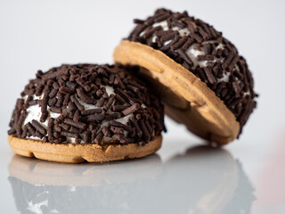 cake with chocolate chips on a white background.