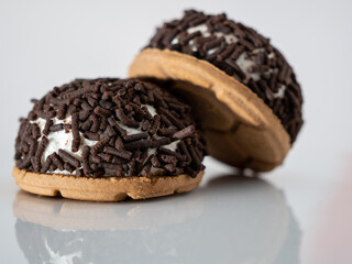 cake with chocolate chips on a white background.