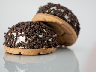 cake with chocolate chips on a white background.