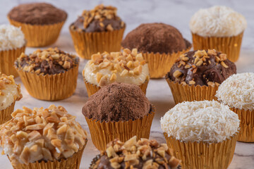 Brigadeiro is a common Brazilian dessert. Delicious chocolate candy Brigadeiro on a table