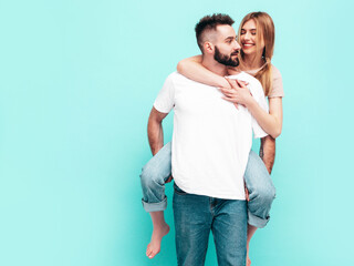 Sexy smiling beautiful woman and her handsome boyfriend. Happy cheerful family having tender...