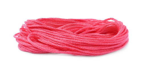 Bright pink embroidery thread on white background