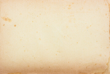 Vintage old yellowed paper page with stains