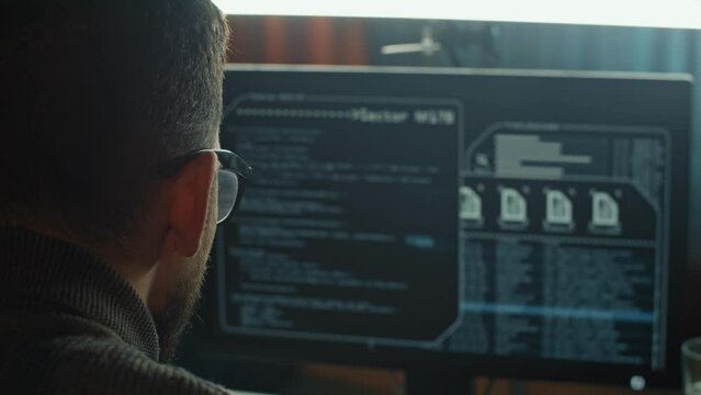 The hacker launched his network virus. His program code is working, and he is happy to finish the success work successful.