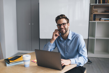 Millenial business man and woman working in office