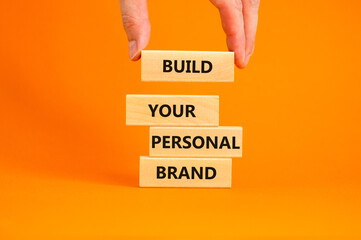 Build your personal brand symbol. Concept words Build your personal brand on wooden blocks....