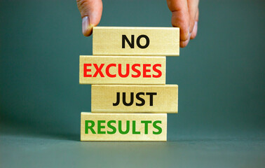 No excuses just results symbol. Concept words No excuses just results on wooden blocks. Businessman hand. Beautiful grey table grey background. No excuses just results business concept. Copy space.