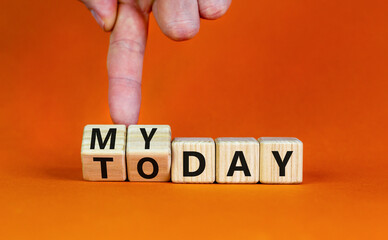 Today is my day symbol. Businessman turns wooden cubes and changes concept words Today to My day....