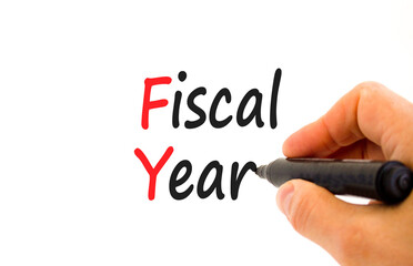 FY Fiscal year symbol. Concept words FY Fiscal year on white paper. Businessman hand with marker. Beautiful white background. Business and FY fiscal year concept.