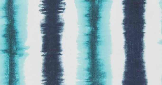 White and blue tie die fabric. Textile backdrop