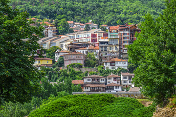 Fototapeta premium Houses on the mountain city landscape - Veliko Tarnovo Bulgaria