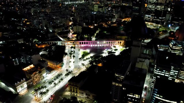 Night scape of Rio de Janeiro Brazil. Panoramic view of illuminated downtown district of Rio de Janeiro Brazil. Buildings and avenue landmark of city. Famous Rio de Janeiro capital city.