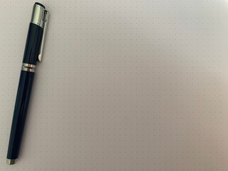 Stift auf  einem Blatt pPpier