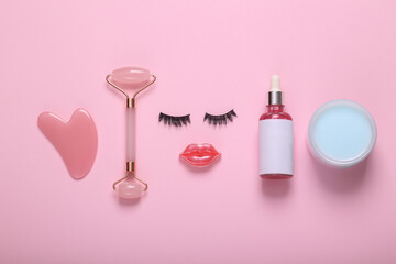 Face of eyelashes and lips with cosmetics and facial skin care products on a pink background. Beauty flat lay