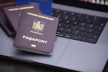 passport and money on the laptop