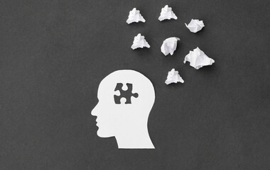 missing jigsaw puzzle of human brain on blak background. Creative idea for solving problem. Mental...